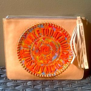 Consuela tan leather clutch bag. Excellent condition, used twice.